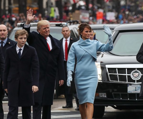 Melania Trump walked along with her son and husband during Trump's inauguration parade in 2016.