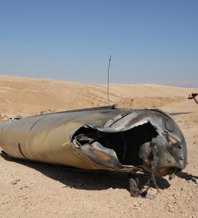 People inspect the remains of an Iranian ballistic missile outside the city of Arad, southern Israel, October 02, 2024. According to the Israeli military, Iran launched over 180 ballistic missiles at Israel on the evening of October 1, with sirens sounding across the country.  (Photo:EPA-EFE/ABIR SULTAN)