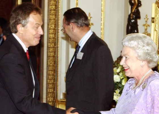 Queen Elizabeth II greeting Prime Minister Tony Blair as he arrives at a reception for The Queen's Award for Enterprise at Buckingham Palace in central London in July 2004 (Photo:PA/Yahoo)