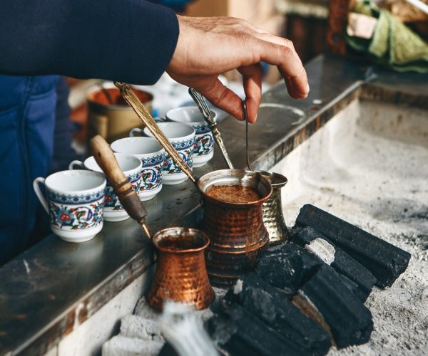 Traditional Turkish charcoal coffee. Cooking fresh aromatic traditional Turkish coffee on charcoal. (Photo: © Franz1212
| Dreamstime.com)