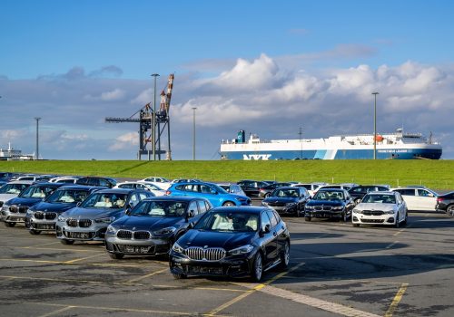 New BMW cars for export at seaport terminal in Cuxhaven, Germany. (Photo: © Bjorn Wylezich
| Dreamstime.com)