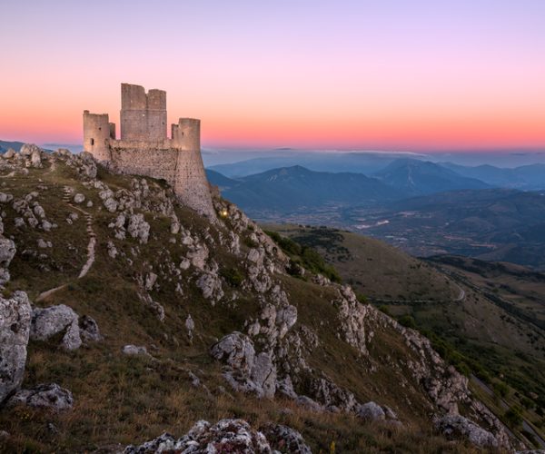 Rocca Calascio at dusk, Abruzzo in Italy (Photo:© Fisfra | Dreamstime.com)
