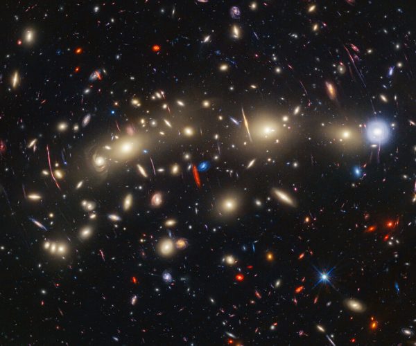 This panchromatic view of galaxy cluster MACS0416 was created by combining infrared observations from the NASA/ESA/CSA James Webb Space Telescope with visible-light data from the NASA/ESA Hubble Space Telescope.  (Photo: NASA, ESA, CSA, STScI)